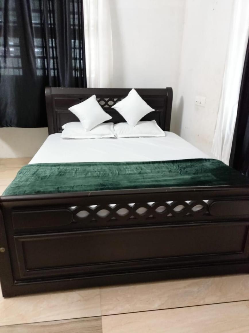 Green Island Homestay Riverside 科泽科德 外观 照片