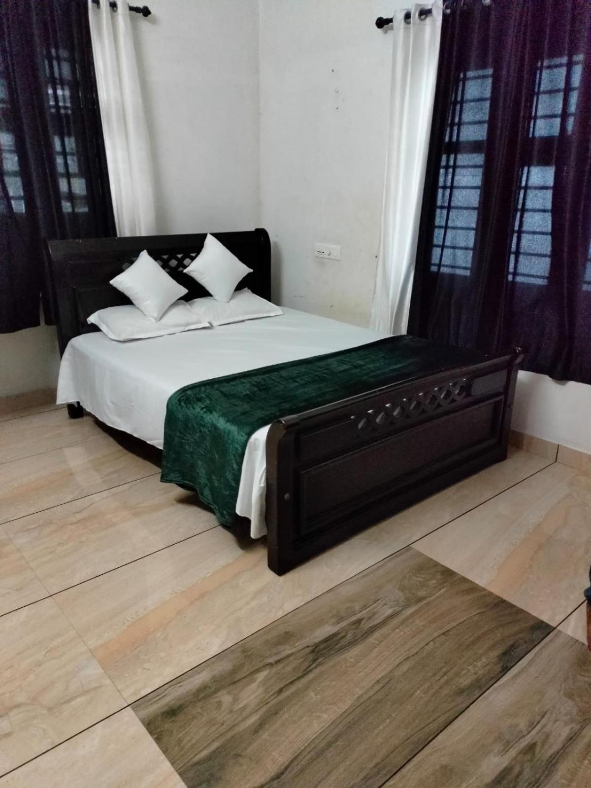 Green Island Homestay Riverside 科泽科德 外观 照片