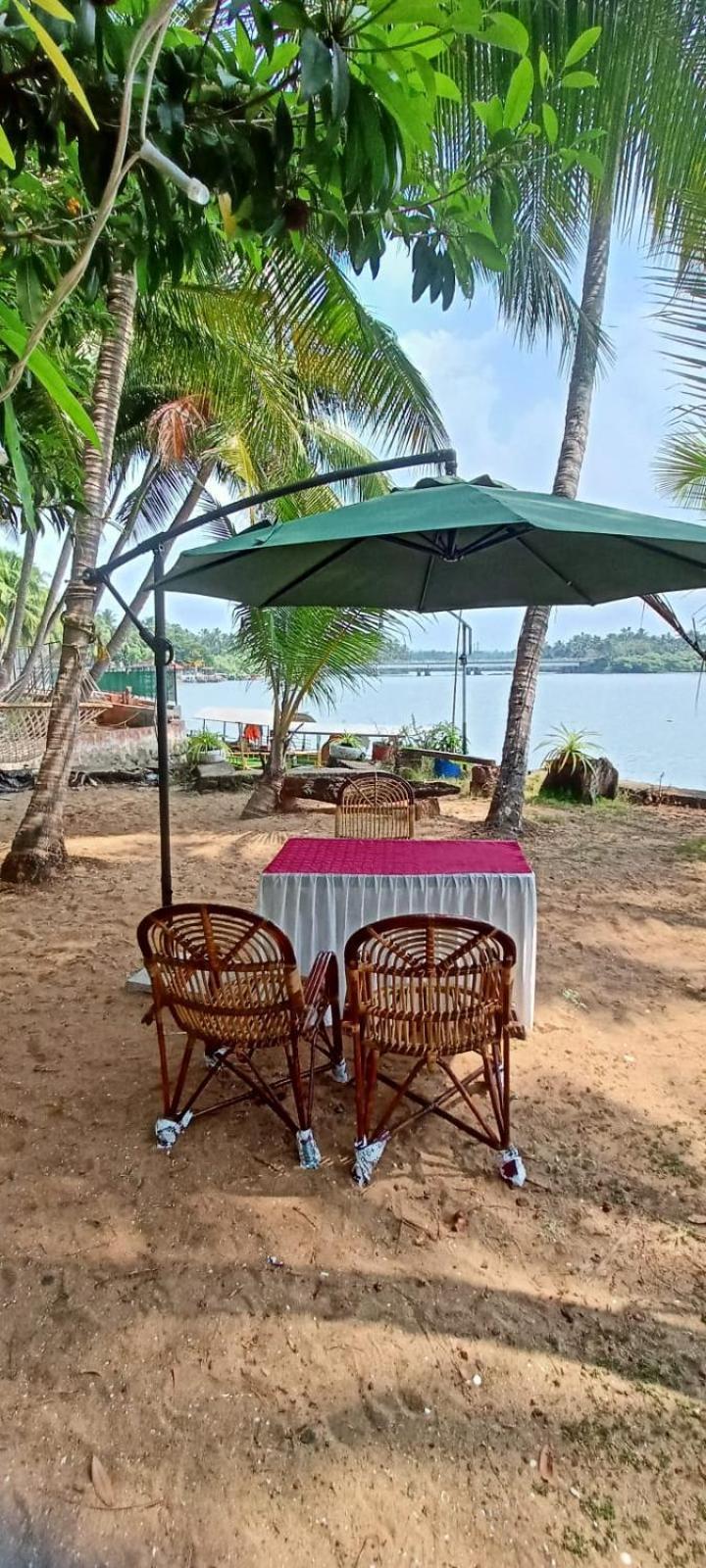Green Island Homestay Riverside 科泽科德 外观 照片