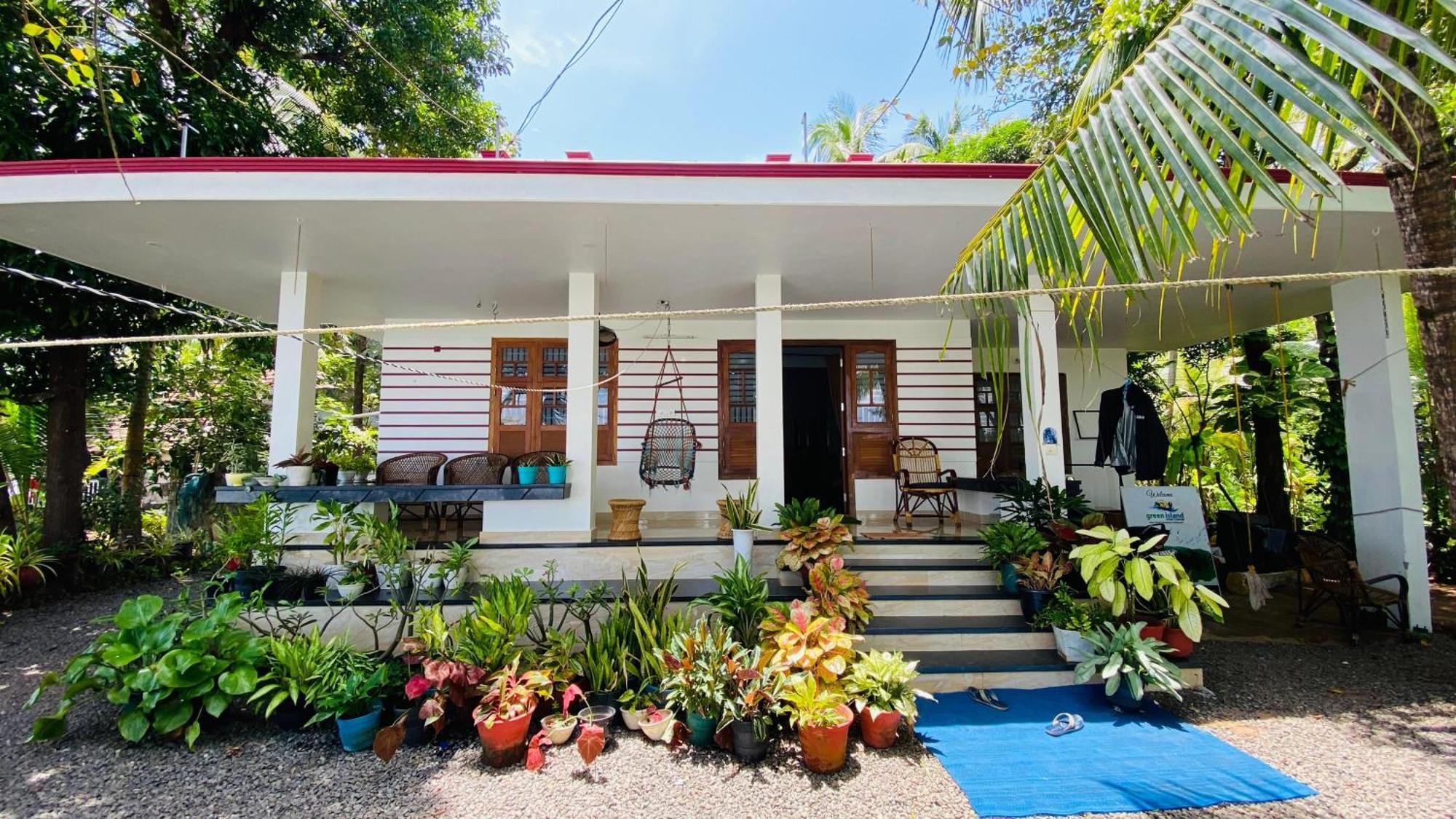Green Island Homestay Riverside 科泽科德 外观 照片