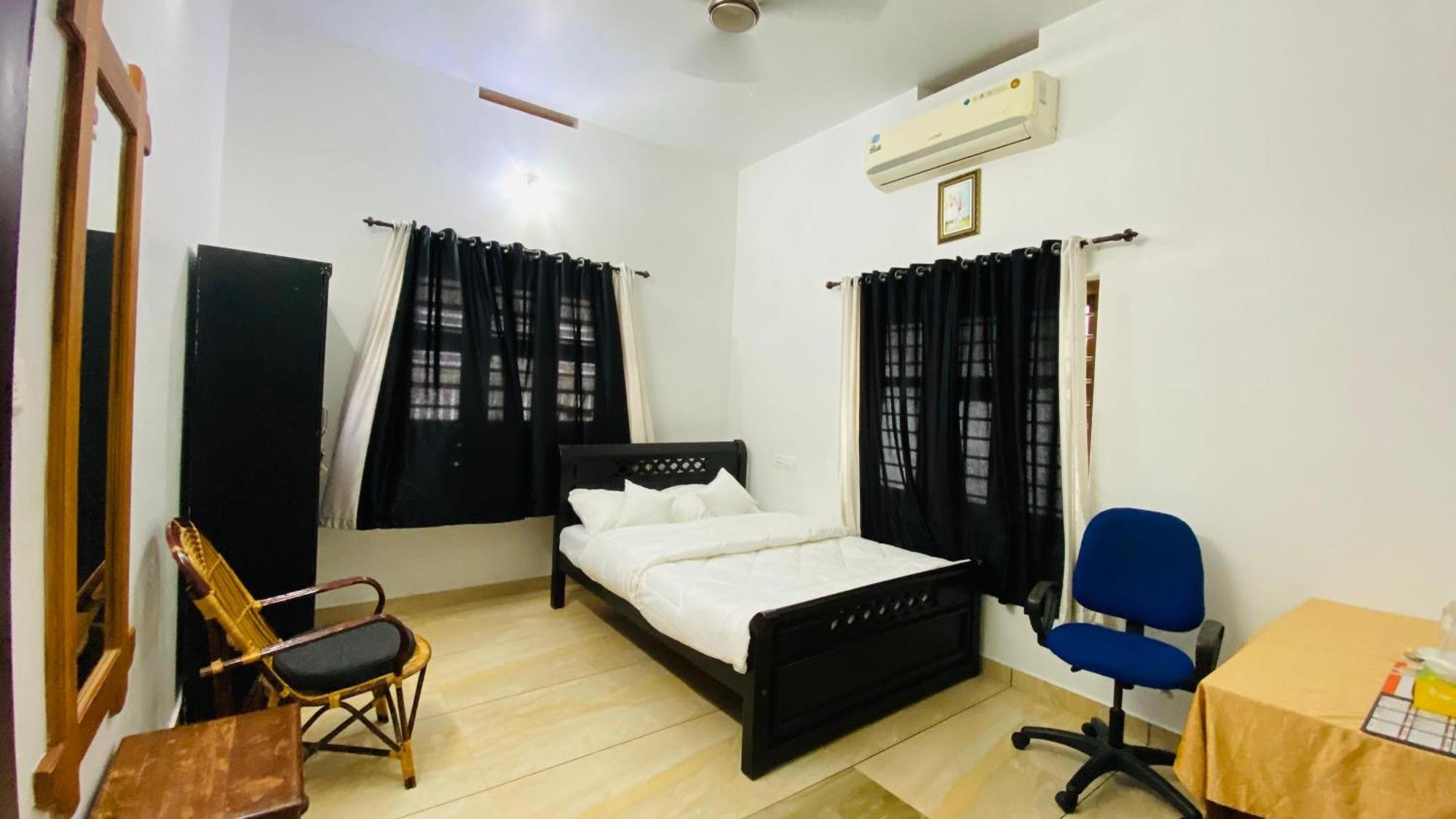 Green Island Homestay Riverside 科泽科德 客房 照片